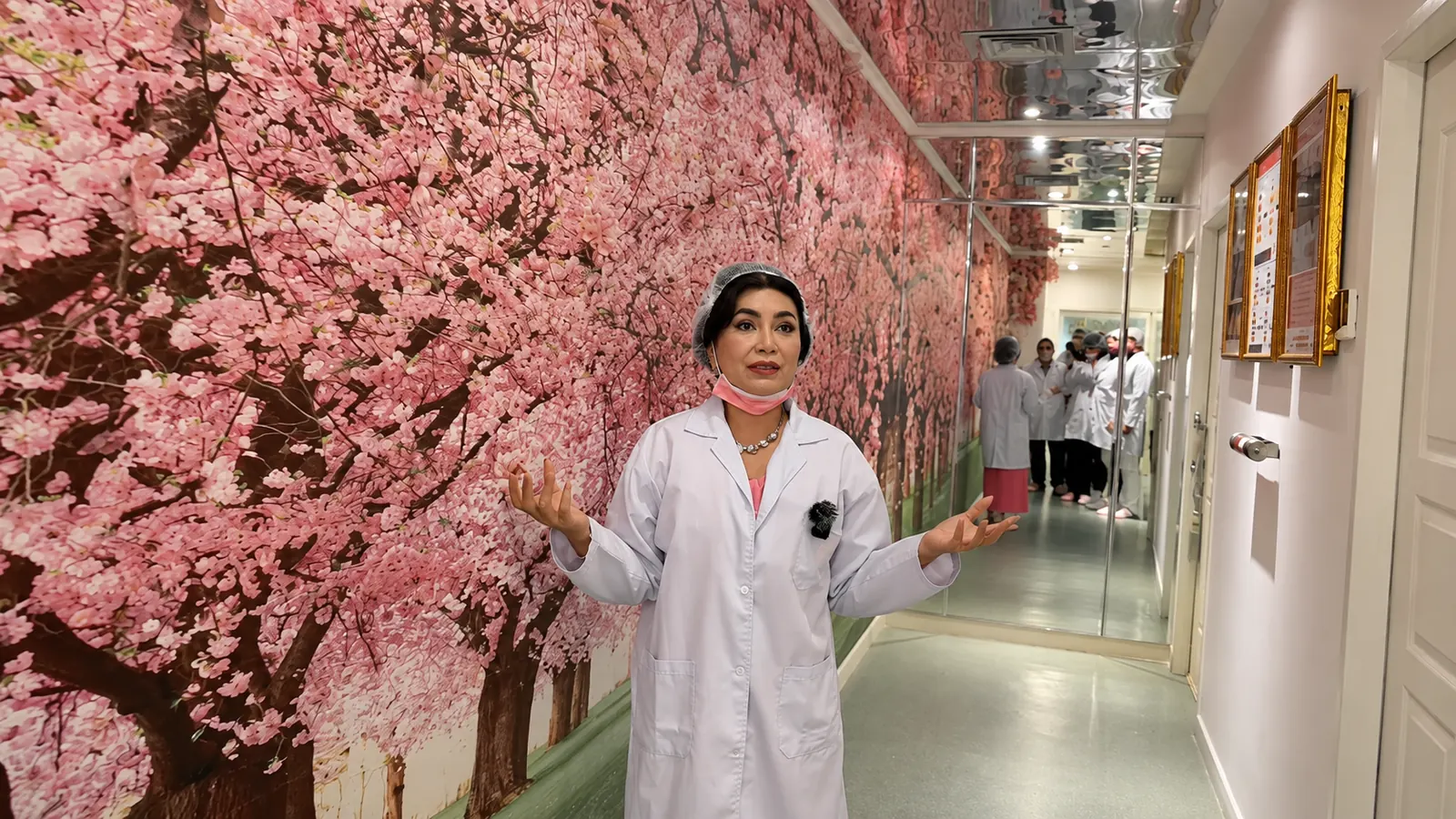 Deby Vinski guiding visitors through the clinical facilities