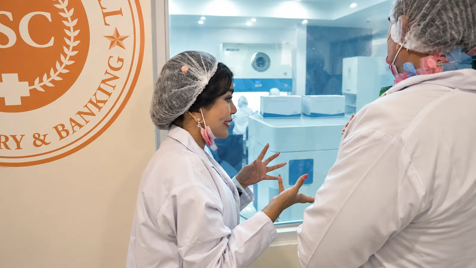 Deby Vinski explaining the laboratory facilities