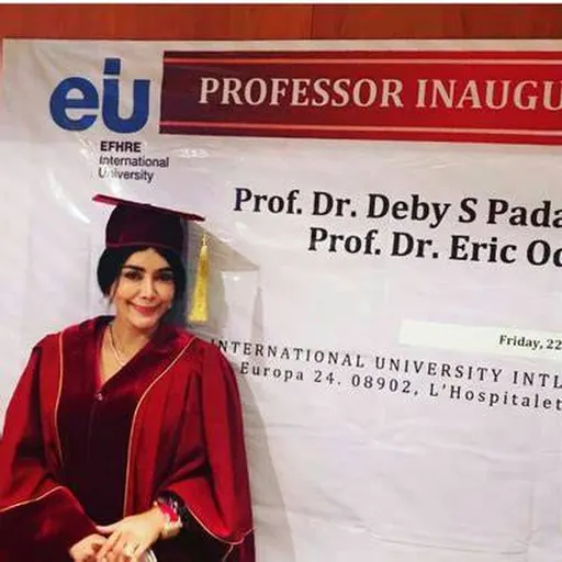 Official EFHRE International University photograph of Deby Vinski in academic regalia