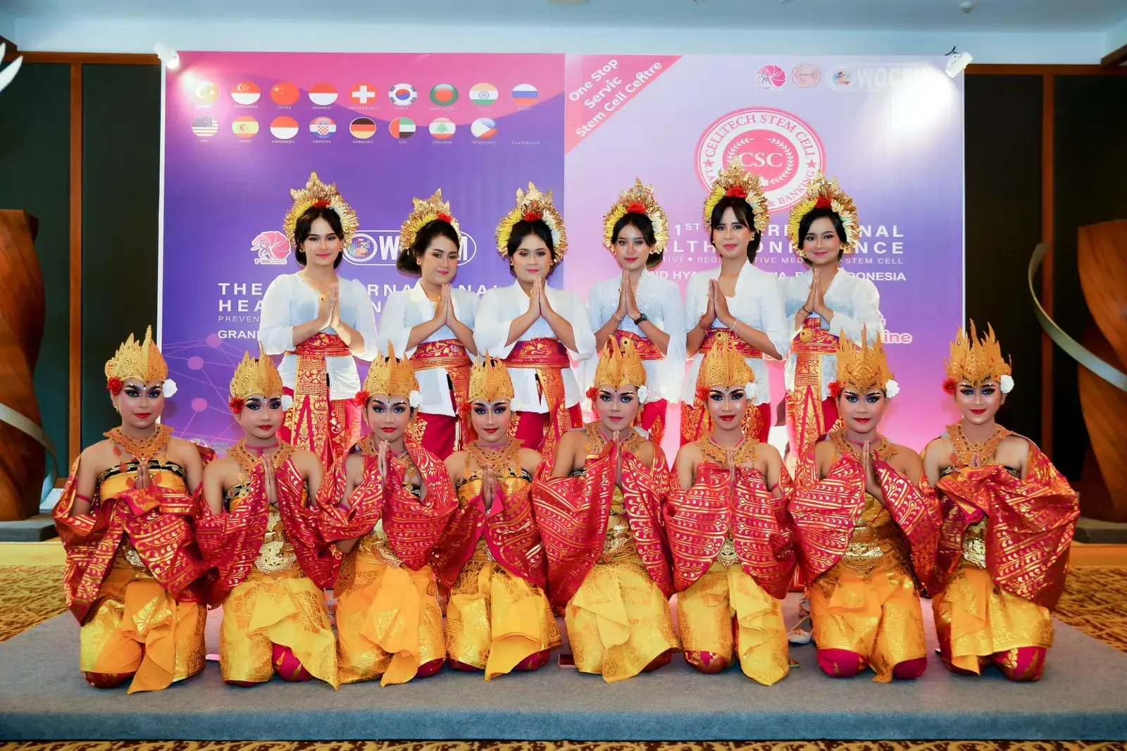 Balinese dancers in traditional dress at an international event in Bali